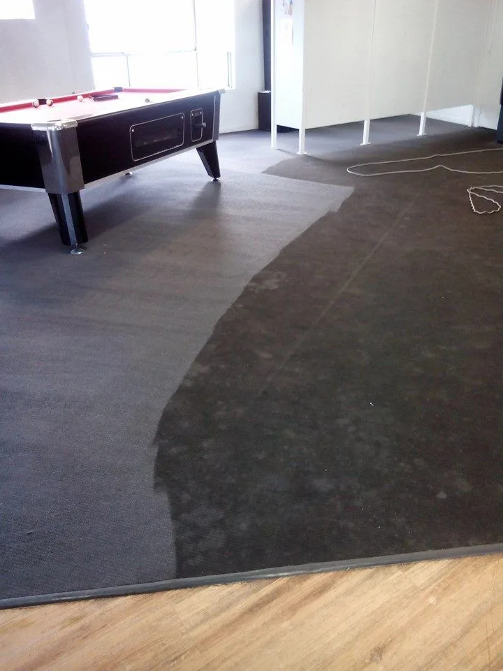 A commercial pool room carpet after cleaning