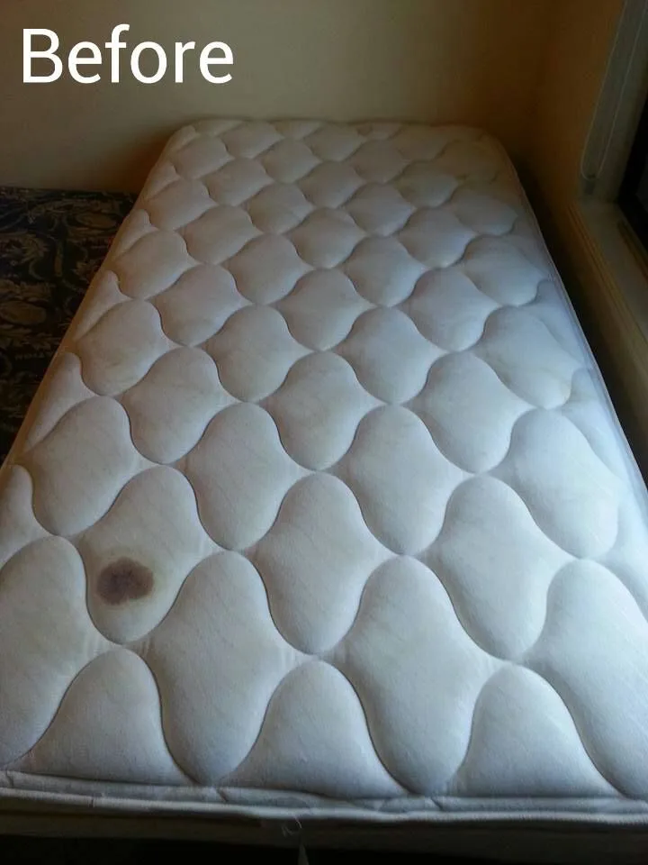 A stained mattress before cleaning
